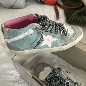 Golden goose high top; mid star sneaker